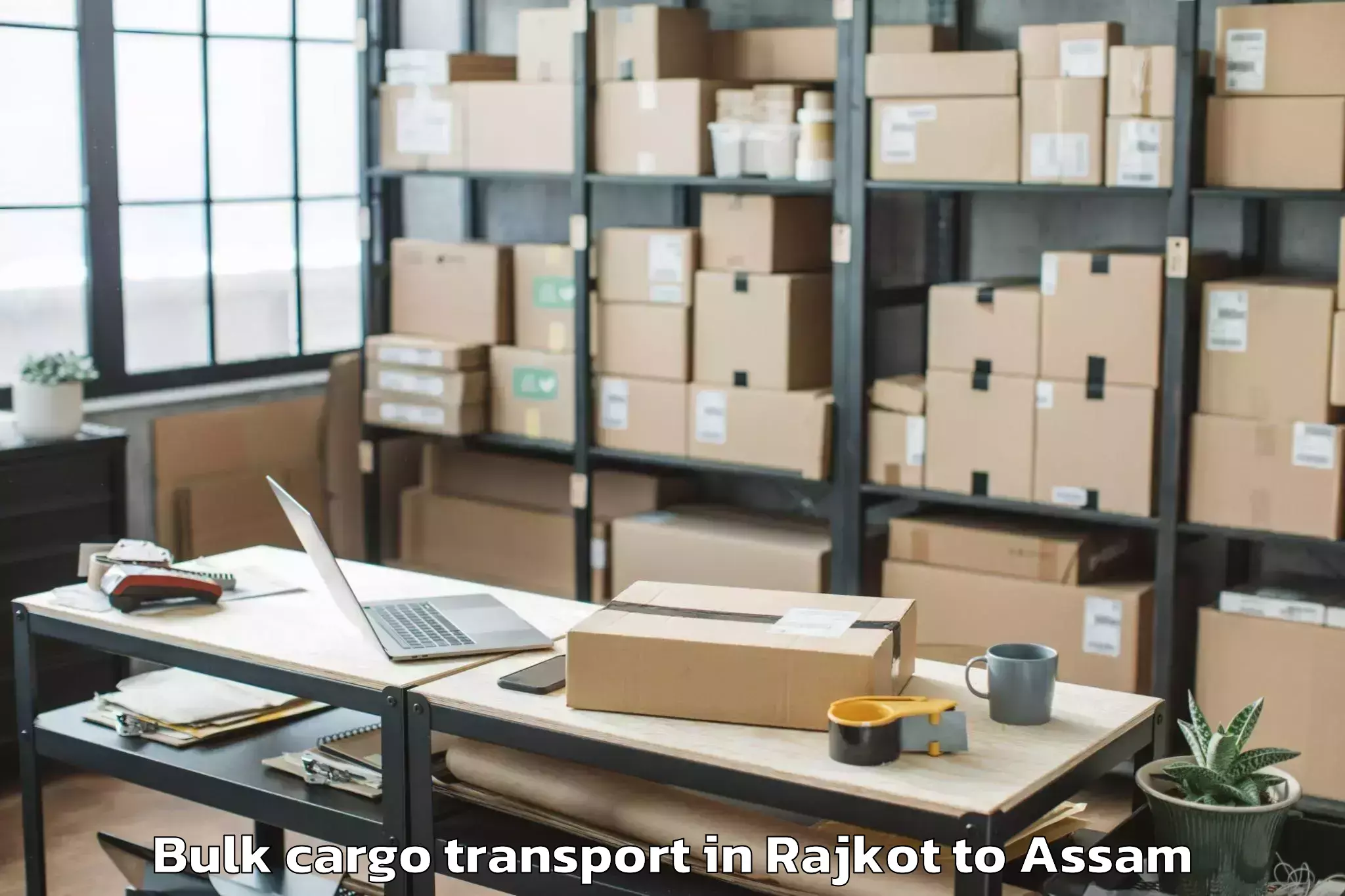 Book Rajkot to Muhimari Bilar Pathar Bulk Cargo Transport